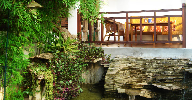 Close-up of one of the two funtain in the coconut garden restaurant  - luang prabang - Laos